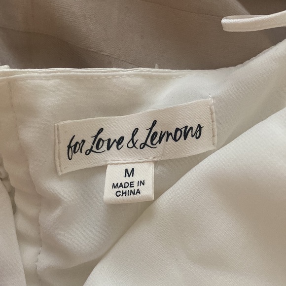 Like new condition Celeste Moire Top in Blanc
For Love & Lemons
Color:Blanc - Picture 3 of 11